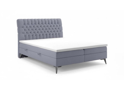Chesterfield bed stoffering design luxe tweepersoonsbed slaapkamer boxspringbed