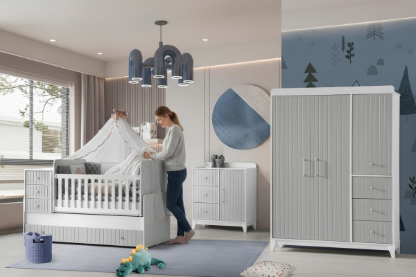 Compleet set voor de kinderkamer: commode, kledingkast, kinderbed in grijze kleur.