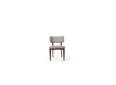 Ontwerper Beige textiel eetkamerstoel Bruine houten poten Design meubels.