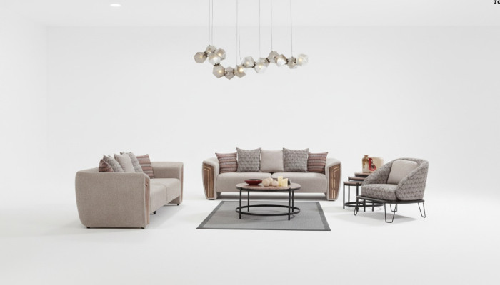 Beige woonkamer gestoffeerde bankstel driezitsbank fauteuil textiel meubels