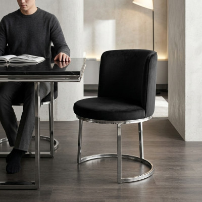 Zwarte designstoel met roestvrijstalen onderstel Moderne eetkamerstoelen Nieuw