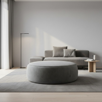 Grijze ronde zitpoef luxe poef slaapkamer meubilair bijzettafel