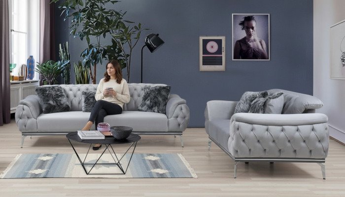 Grijze woonkamer stoffen bank Modern design Chesterfield textielmateriaal
