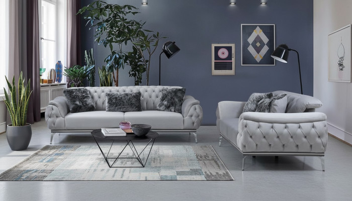 Grijze woonkamer stoffen bank Modern design Chesterfield textielmateriaal