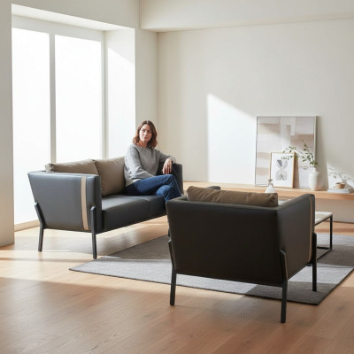 Werkruimte zitmeubilair luxe grijze lederen 2-zitsbank chique fauteuil