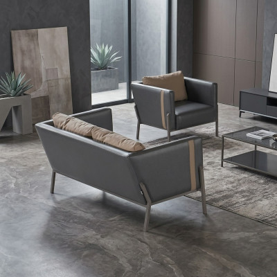 Werkruimte zitmeubilair luxe grijze lederen 2-zitsbank chique fauteuil