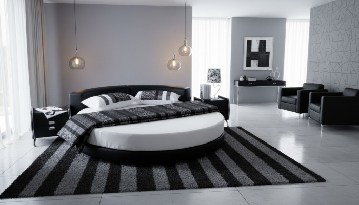 Moderne zwarte bed met elegante details en bank