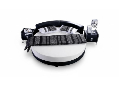 Moderne zwarte bed met elegante details en bank