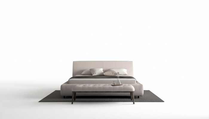 Elegante beige bed met kussen