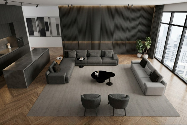 Elegante hoekbank met twee fauteuils die design en comfort combineert