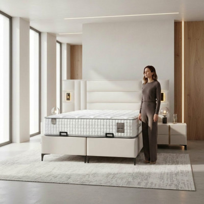 Elegante witte bed met stof en houten matras