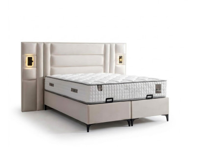 Elegante witte bed met stof en houten matras
