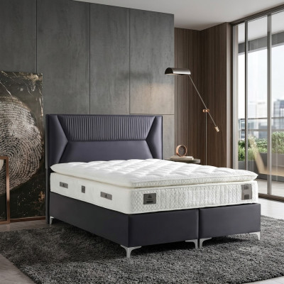 Elegante grijze bed met stoffen en houten matras